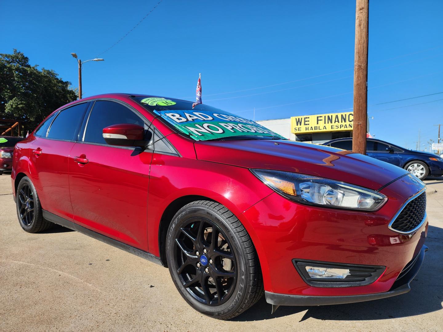 2016 BURGUNDY Ford Focus SE (1FADP3F25GL) with an 2.0L L4 DOHC 16V engine, AUTO transmission, located at 2660 S.Garland Avenue, Garland, TX, 75041, (469) 298-3118, 32.885551, -96.655602 - Welcome to DallasAutos4Less, one of the Premier BUY HERE PAY HERE Dealers in the North Dallas Area. We specialize in financing to people with NO CREDIT or BAD CREDIT. We need proof of income, proof of residence, and a ID. Come buy your new car from us today!! This is a Super Clean 2016 FORD FOCUS - Photo#1